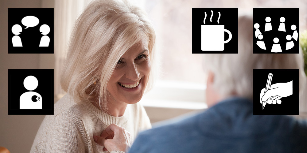 En leende kvinna samtalar med en man vid ett bord, omgiven av ikoner för samtal, kaffe, grupp, skriva och hjärta.