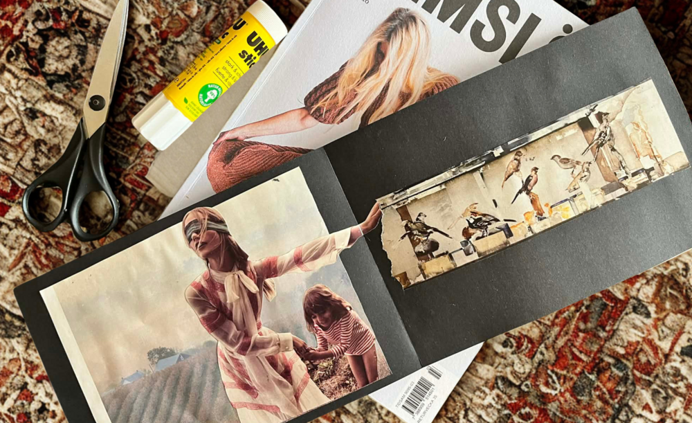 En öppen scrapbook med utklippta bilder, sax, limstift och tidning på en mönstrad matta.