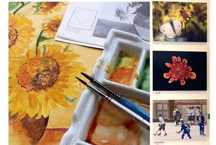 Akvarellmålning av solrosor, penslar, färgpalett och konstbilder på en vägg, inklusive fjäril, blomma och ishockeyspelare.
