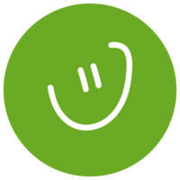 Grön cirkel med en vit, stiliserad glad smiley i mitten.