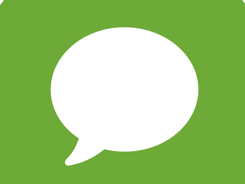 Grön cirkel med en vit pratbubbla i mitten, symboliserar kommunikation eller meddelande.