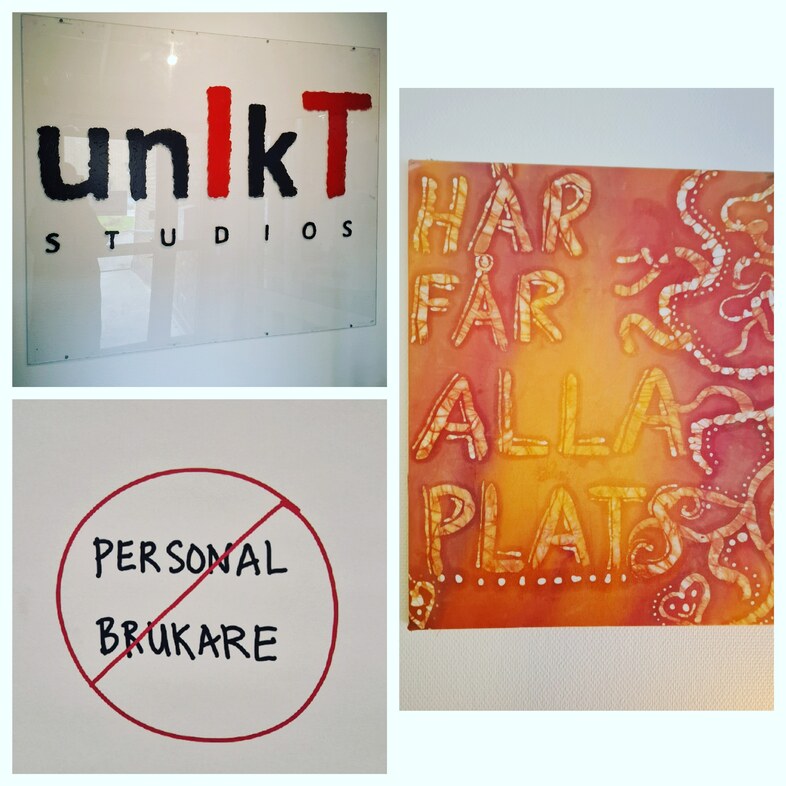 Tre skyltar: en med texten 'unikt studios', en med överstruken 'personal brukare', och en med 'här får alla plats'.