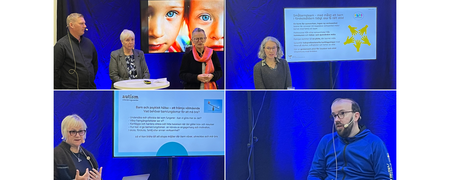 Fyra personer deltar i en paneldiskussion om barns psykiska hälsa, med presentationer på skärmar i bakgrunden.