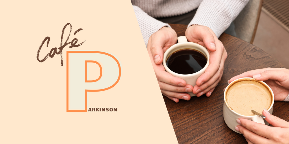 Två personer håller kaffekoppar vid ett runt bord, bredvid en logotyp med texten Café Parkinson.