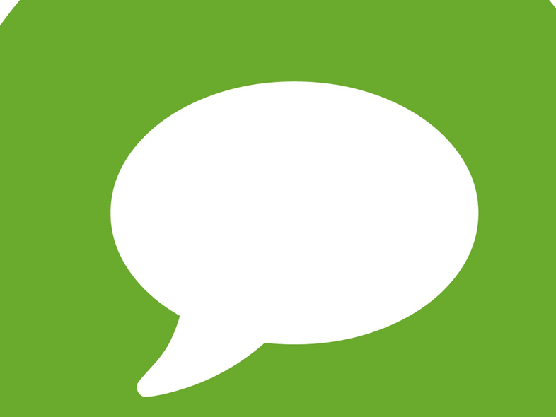 En vit pratbubbla i mitten av en grön cirkel, symboliserar kommunikation eller meddelande.