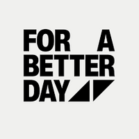 Svart text på vit bakgrund: 'FOR A BETTER DAY' med två svarta trianglar under ordet 'DAY'.