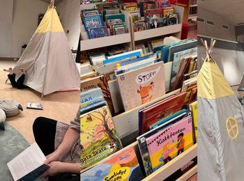 Barnbibliotek med tält, kuddar och barnböcker. Mysig läshörna och bokhyllor med färgglada omslag.