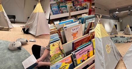 Barnbibliotek med tält, kuddar och barnböcker. Mysig läshörna och bokhyllor med färgglada omslag.